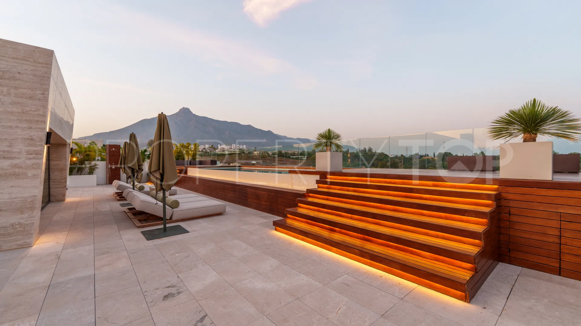 the steps up to the rest of the terrace. The mountain is included.